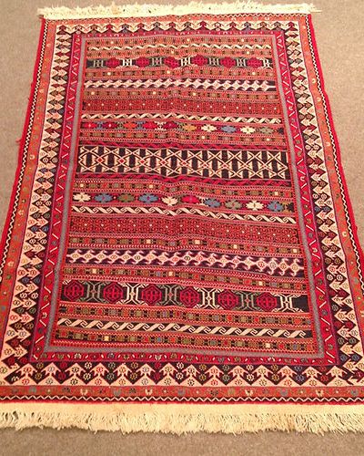 Handmade Afghan Carpets and Rugs: A Timeless Craft