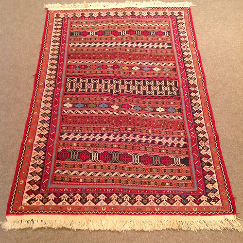 Handmade Afghan Carpets and Rugs: A Timeless Craft